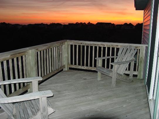 Enjoy a pleasant evening on the upper deck...Embrace a beautiful sunset to the west as shown in this photo....